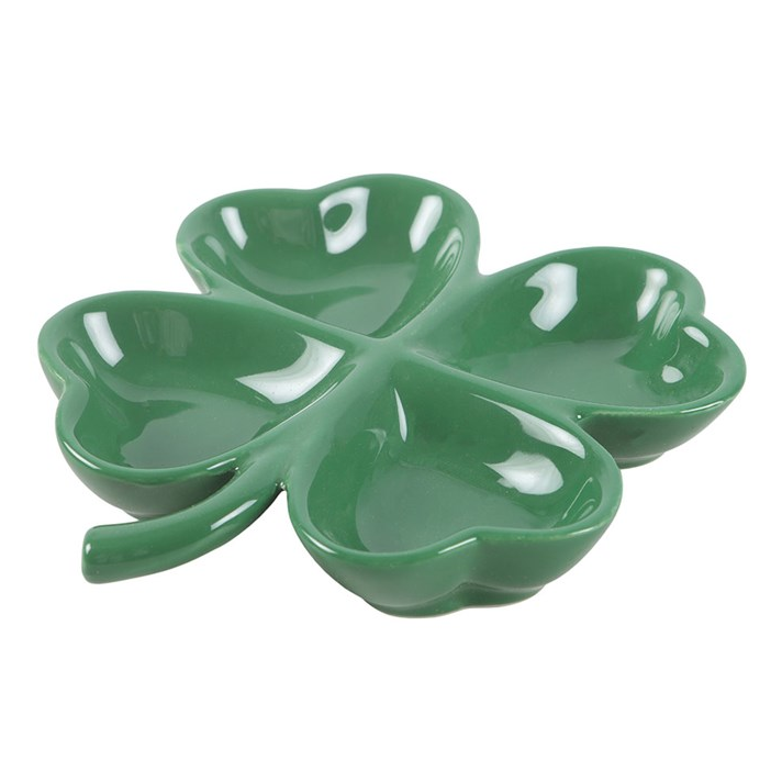 Green ceramic four-leaf clover dish on a white background