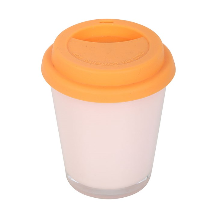 Candle in the shape of a travel coffee mug