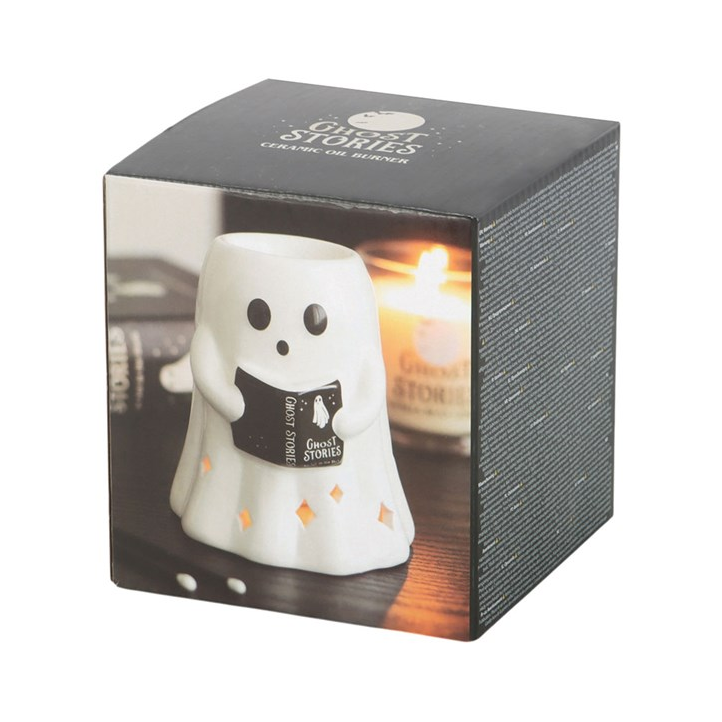 Ghost-shaped oil burner in a box packaging on a white background