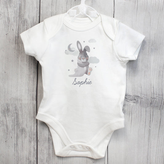 White baby vest with rabbit design and name underneath