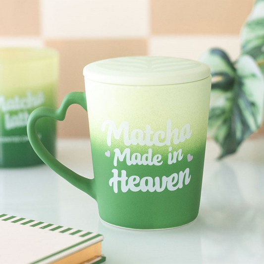 Green mug with 'Match Made in Heaven' text on a light surface