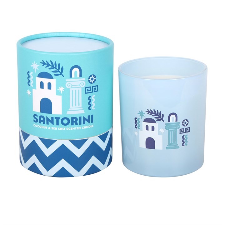 Santorini-themed candle set with blue and white design on a white background