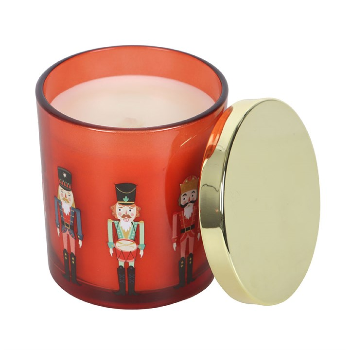 Decorative candle in a red container with nutcracker design and gold lid on a white background