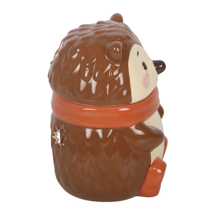 Hedgehog-shaped oil burner with a lid on a white background