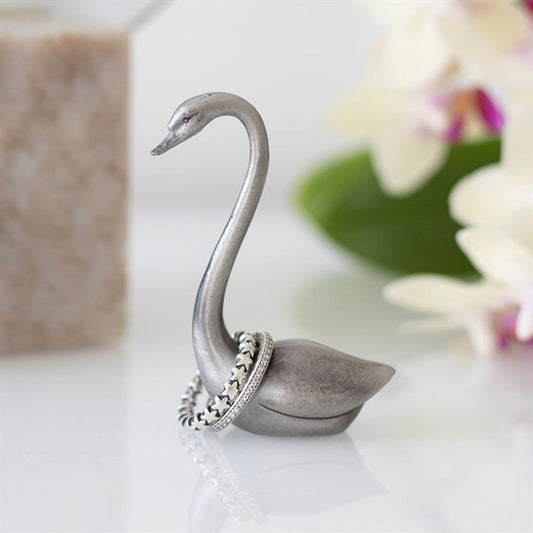 Elegant swan-shaped ring holder made of iron, perfect for storing rings on a dressing table or vanity